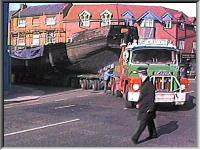 Spry on a low loader passing through Worcester
