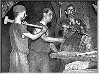 A 'pare' beating the borer from J.C.Burrows 'Mongst Mines & Miners'