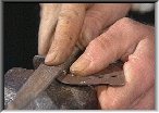 Filing a padlock