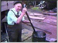Mixing tar for oakum caulking