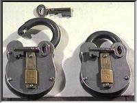 Two English steel padlocks
