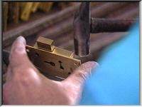A brass cabinet lock