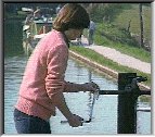 Opening lock gate paddles