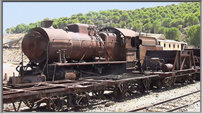 Abandoned steam loco at Las Zarandas Station on the Rio Tinto railway