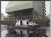 A Cawoods Hargreaves push tug passing the boat hoist