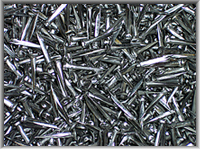 A tray of finished tacks.