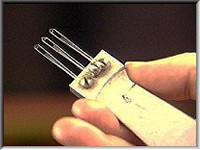 Mrs Pitcher's hand held narrowing comb