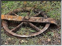 A small pulley wheel, possibly from the signalling system
