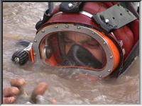 A diver working on the dredger