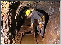 Examining a flat bed mine truck in Robert's level