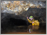 Paul Thorne exploring the 120m level in the direction of the Boat Level