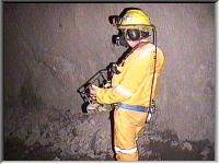 Miner with radio control at Tara Zinc mine.